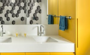 Yellow Bathroom with Hexagon Tile O'Keefe Fiorenza Design Group